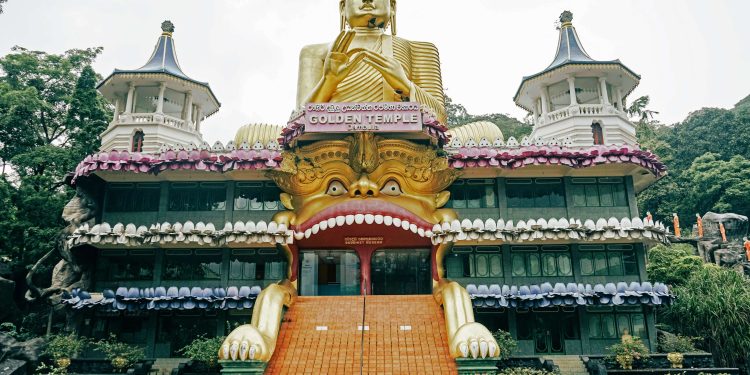 Dambulla Cave Temple on rocky hill in Sri Lanka
